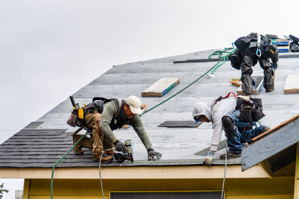 Professional Roofing technician working in Trumbauersville, PA